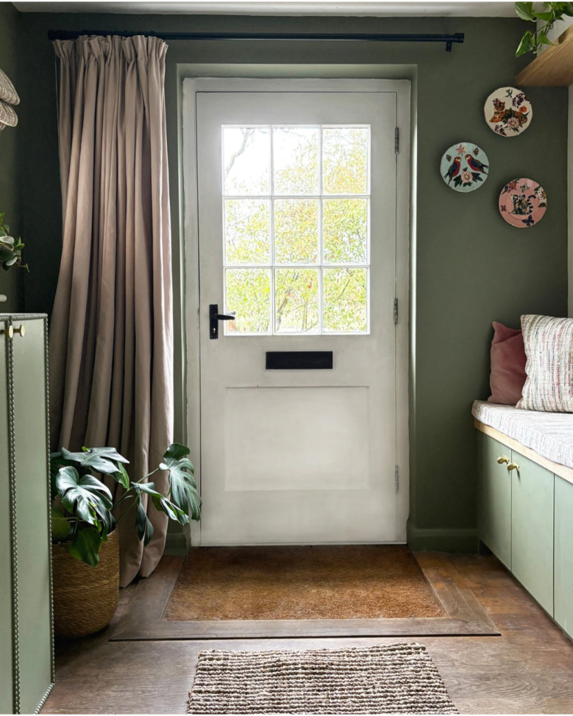 Front door with curtains, seat bench and shoe storage